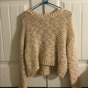 A tan sweater
